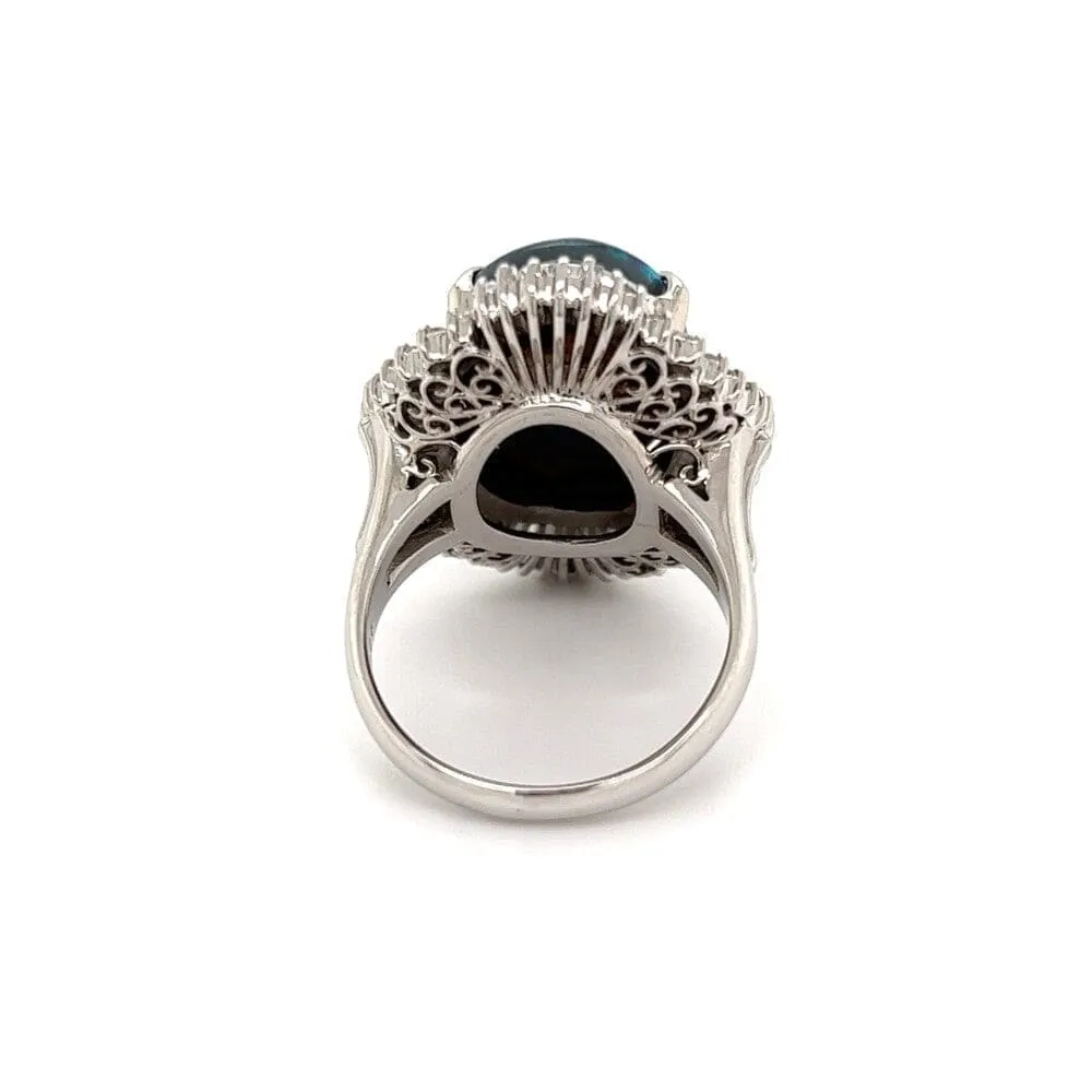 Beautiful Black Opal Set in Platinum Ring with Diamond Halo at Regard Jewelry in Austin, Texas