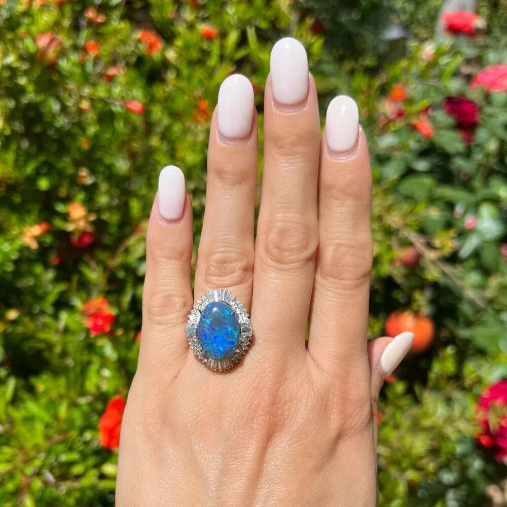 Beautiful Black Opal Set in Platinum Ring with Diamond Halo at Regard Jewelry in Austin, Texas