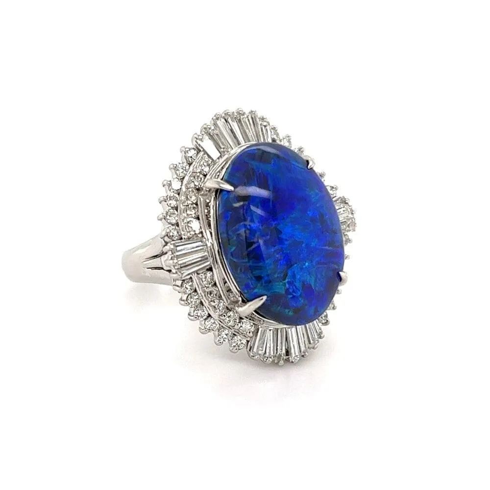 Beautiful Black Opal Set in Platinum Ring with Diamond Halo at Regard Jewelry in Austin, Texas