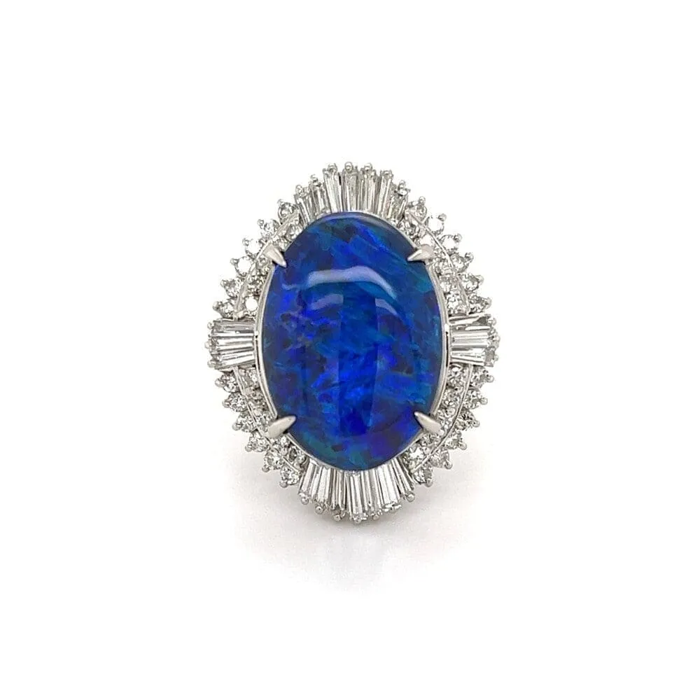 Beautiful Black Opal Set in Platinum Ring with Diamond Halo at Regard Jewelry in Austin, Texas
